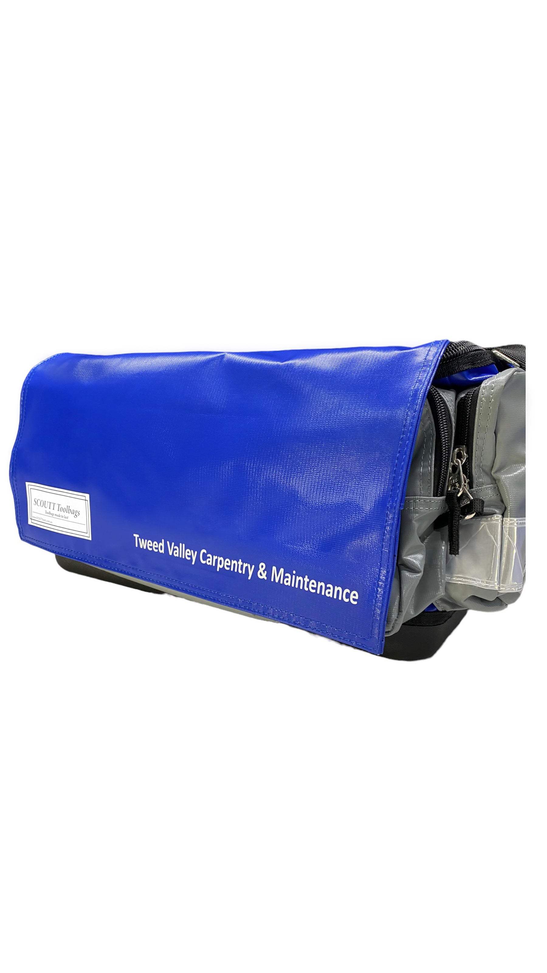 Customizable tool bag with personalized logo on blue front flap.